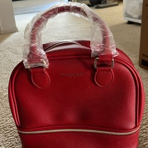 Red Elizabeth Arden handbag